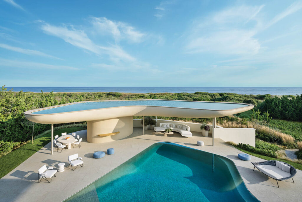 an outdoor pool with a reflecting-pool roof above it