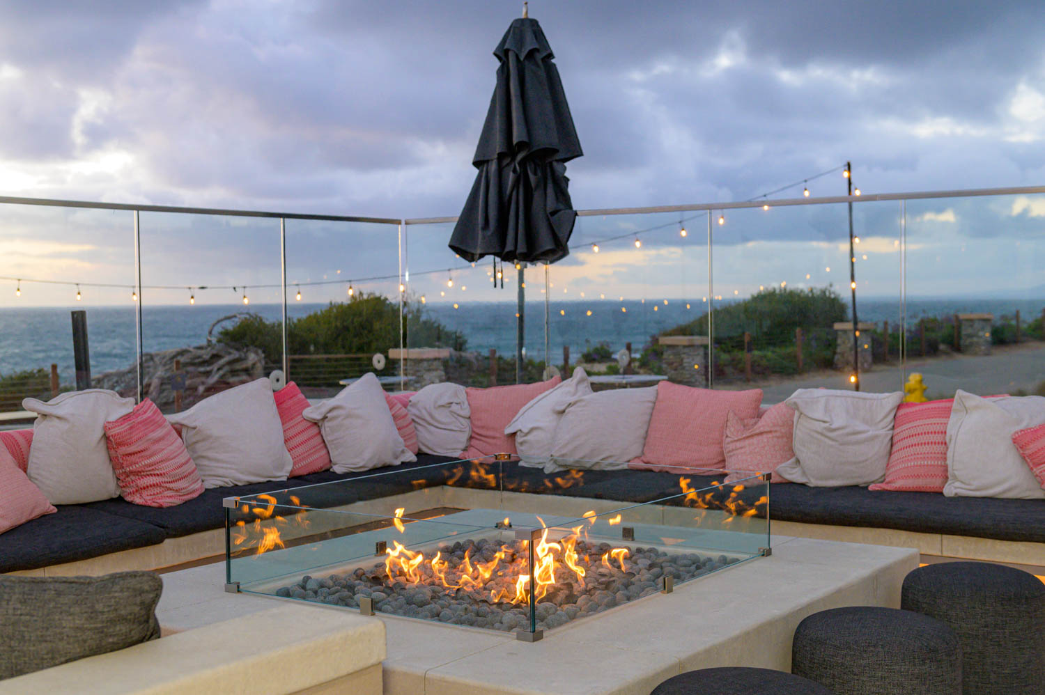 a firepit with ocean views