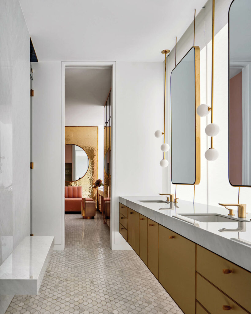 a white bathroom with double sinks