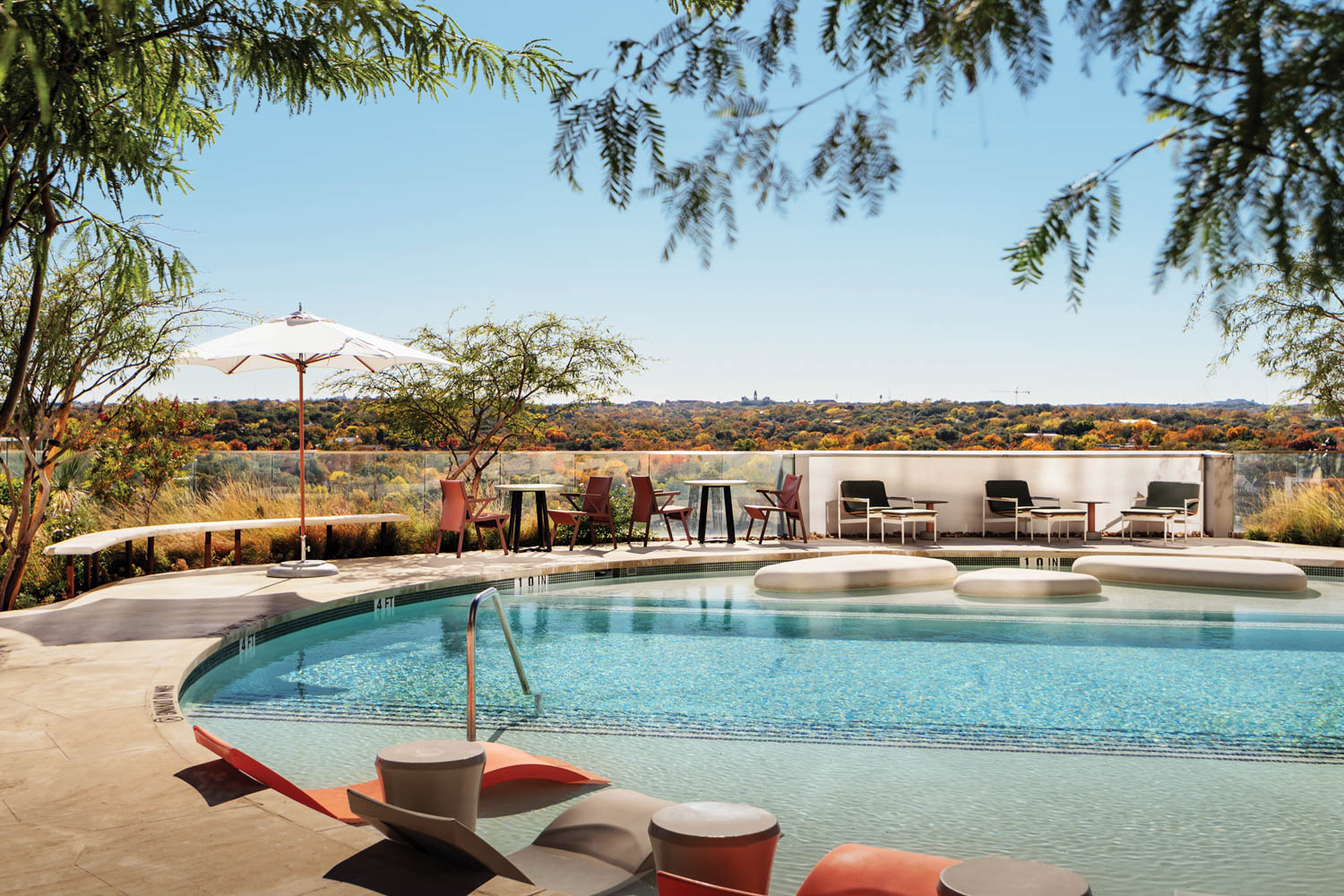 an outdoor pool at a Texas condo tower