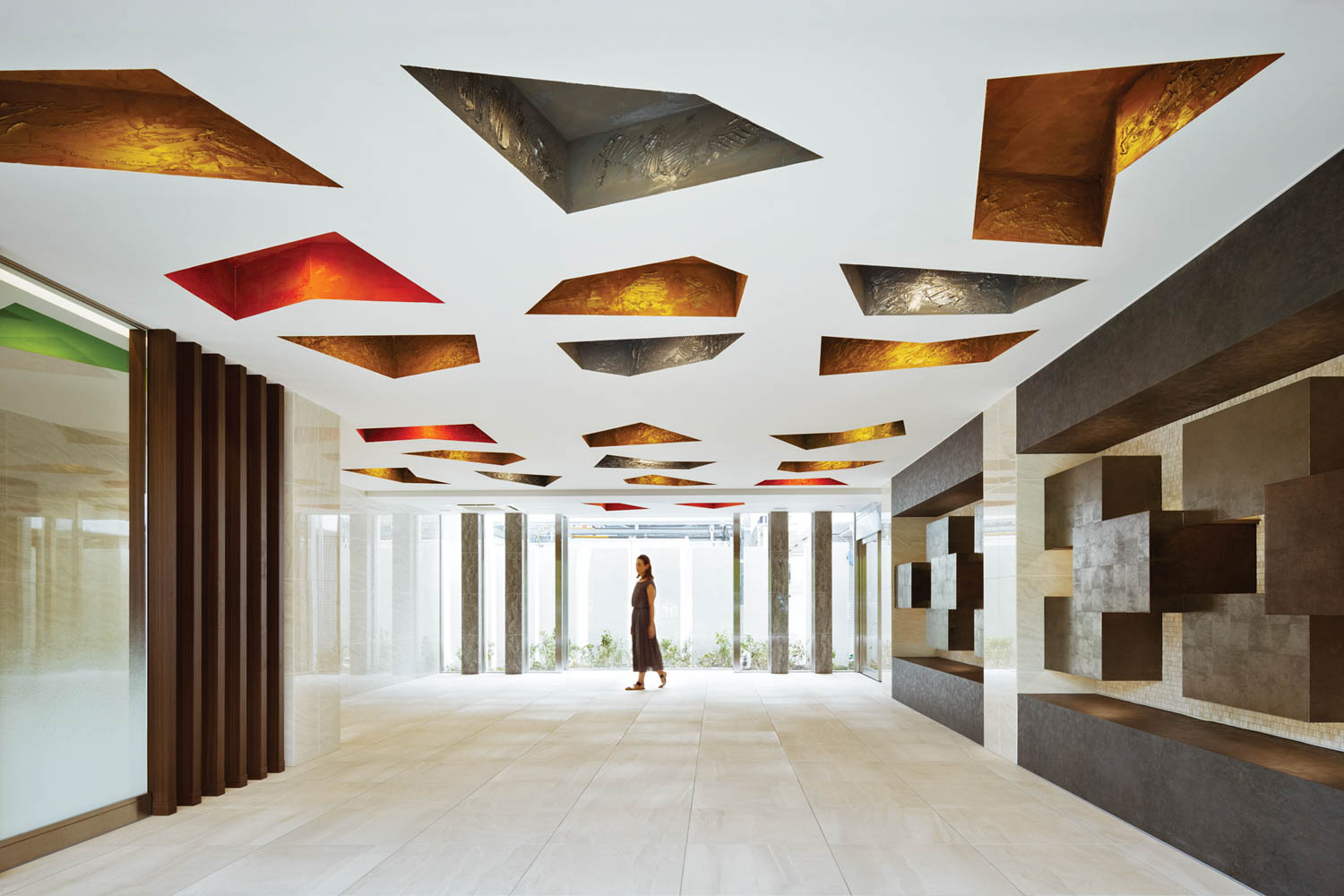 illuminated resin ceiling recesses in the entrance to a Japanese condominium building