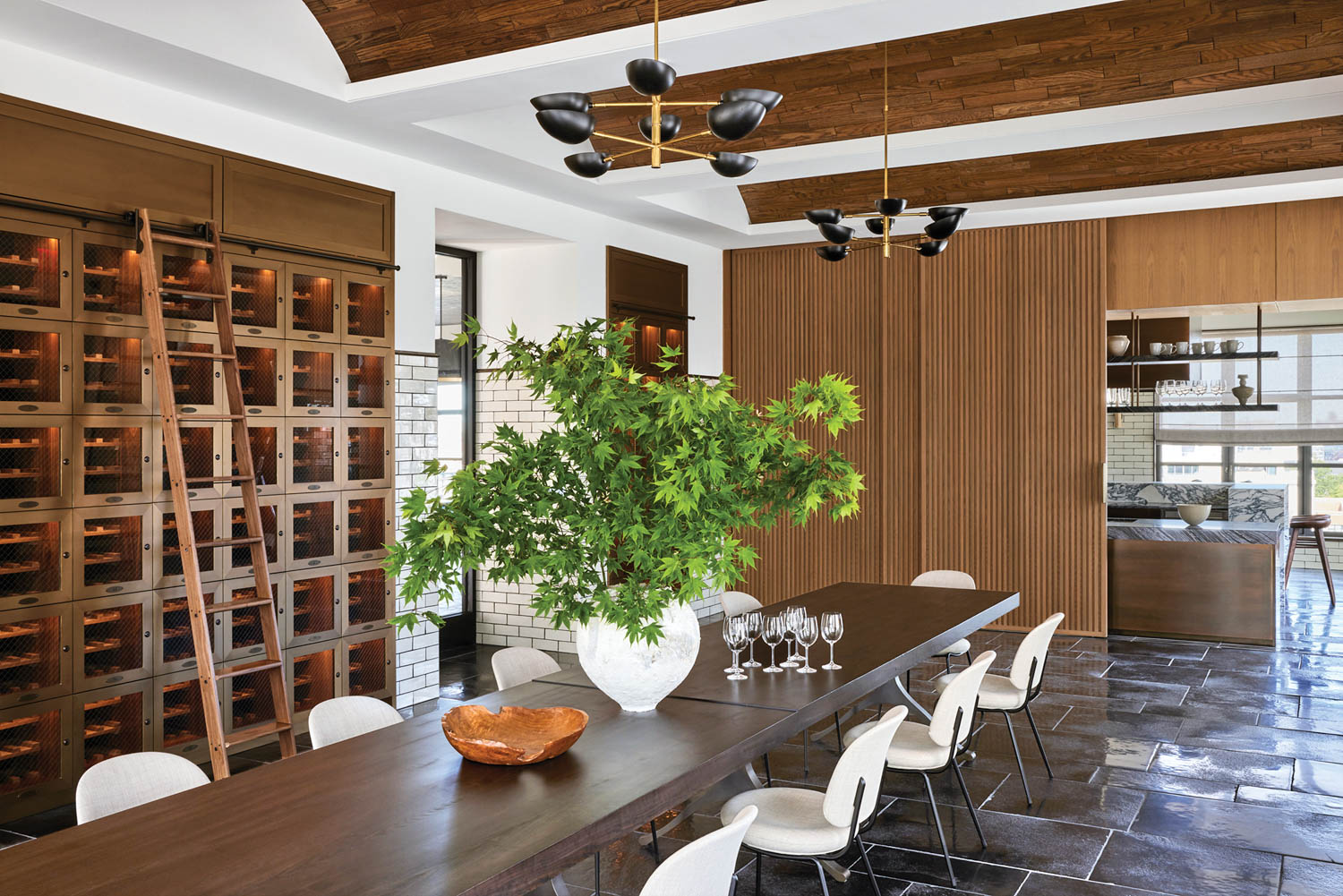 a wine room with limestone floors