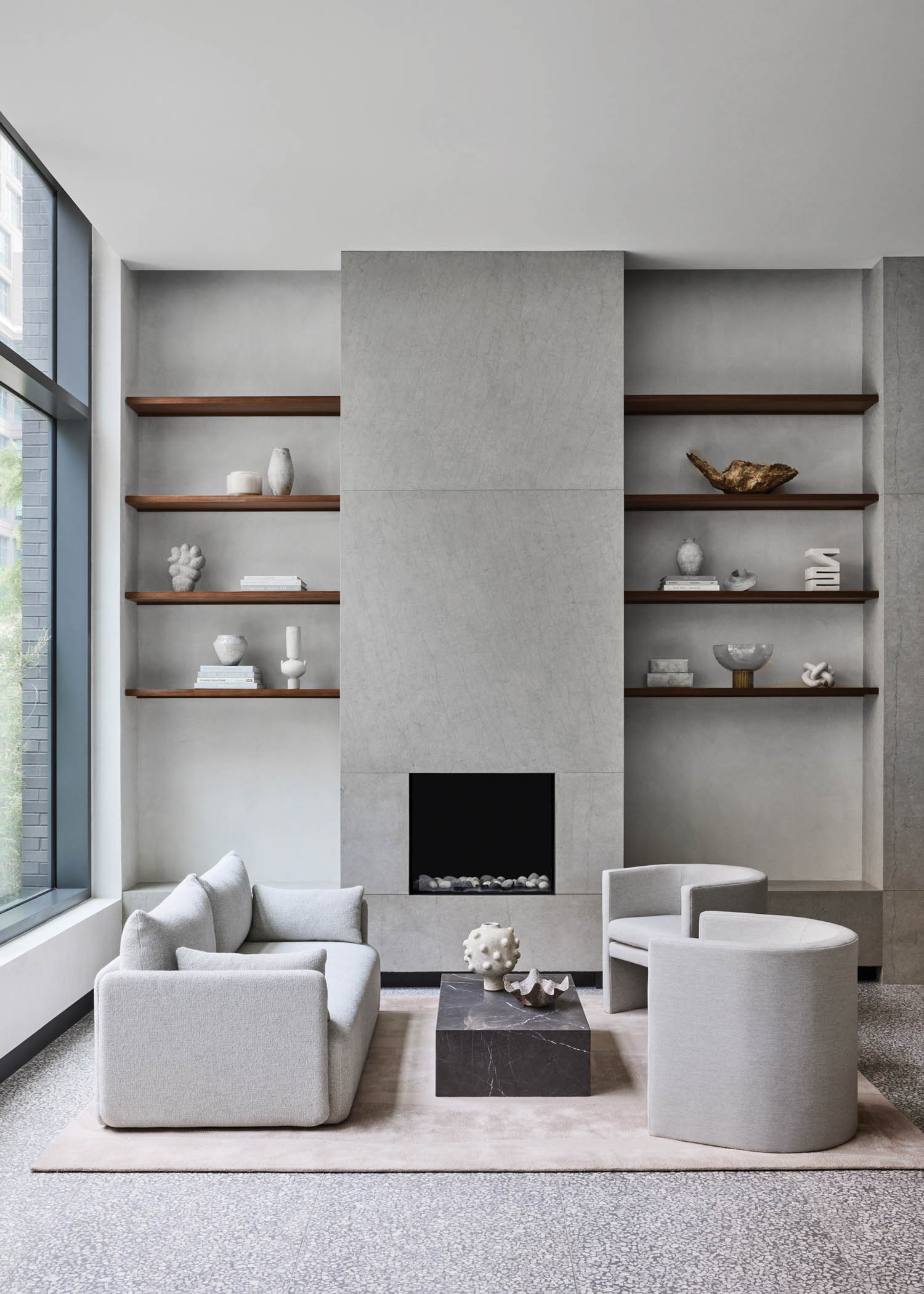 a monochrome grey lobby in a New York condo building