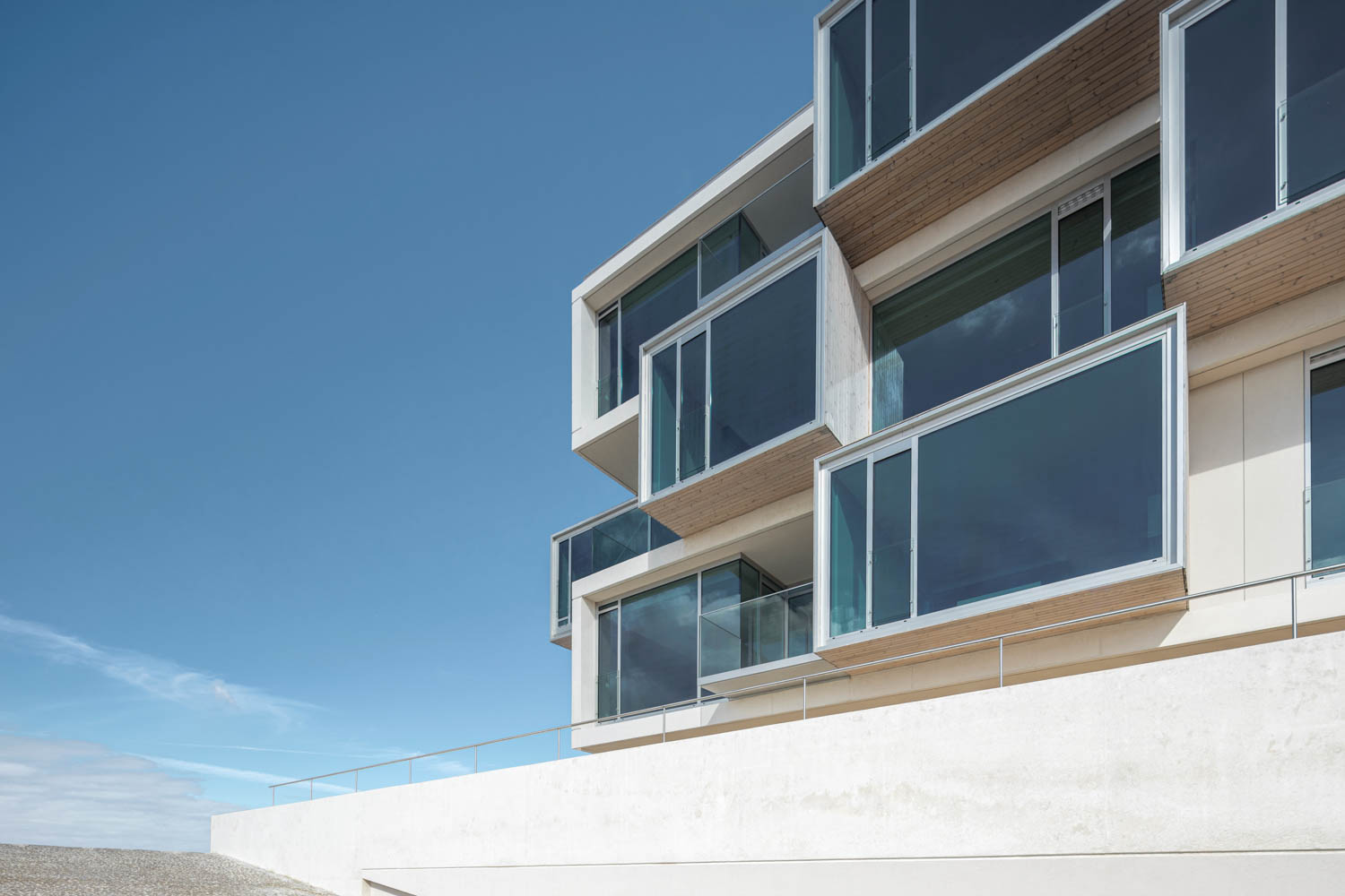 the exterior overlapping windows of a Portuguese apartment building