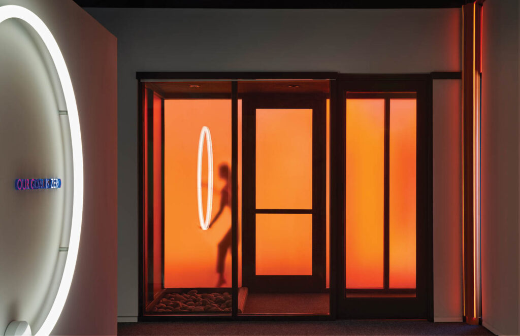 room with orange lights and doors