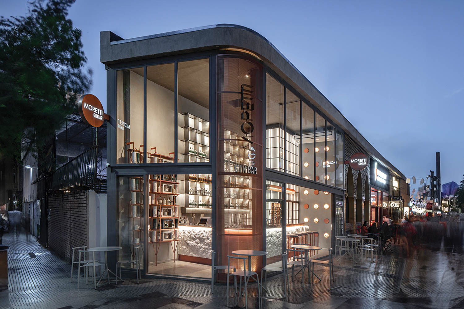 exterior facade of restaurant with large floor to ceiling windows