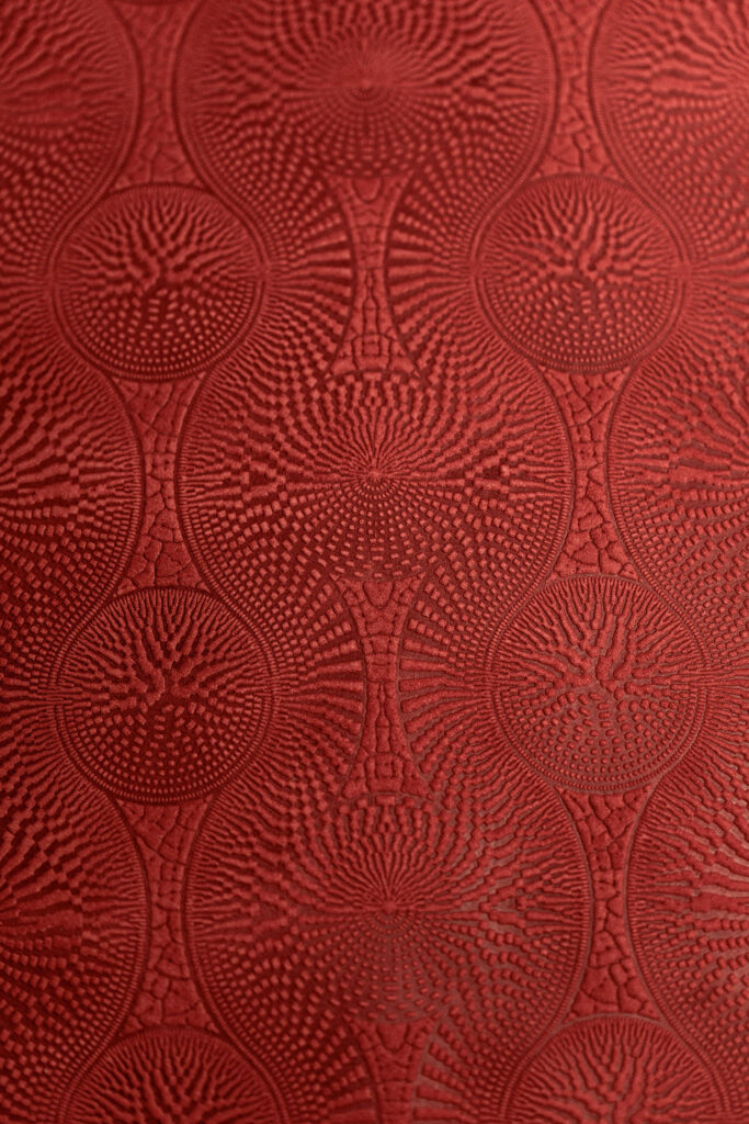 deep red patterned textile