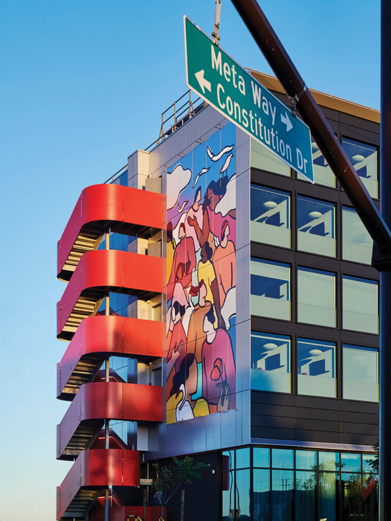 exterior view of hotel and view of a colorful mural